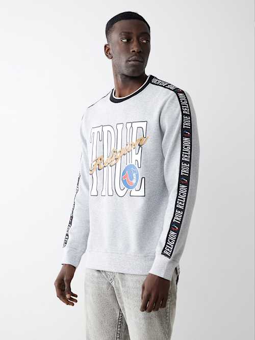 ТОЛСТОВКА С НАКЛЕЕННЫМ НА НЕЕ ЛОГОТИПОМ