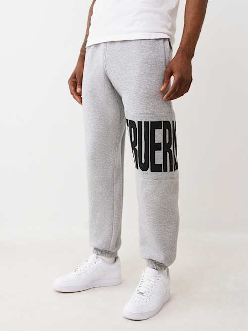 ДЖОГГЕР ДЛЯ БЕГА ТРУСЦОЙ С ВЯЗАНОЙ ВСТАВКОЙ ЛОГОТИПА