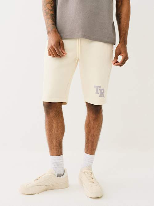 КОРОТКИЙ СВИТШОТ С МЕТАЛЛИЧЕСКИМ ЛОГОТИПОМ