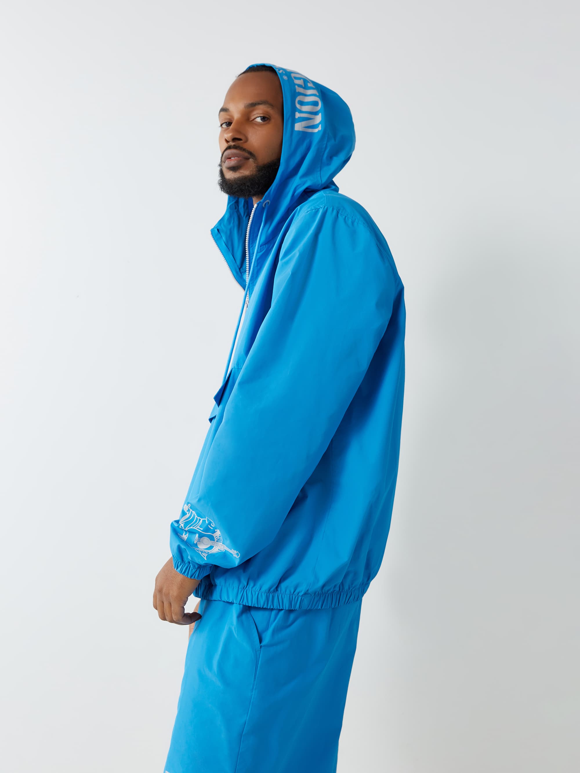 HALF ZIP WINDBREAKER