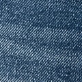 BECCA MID RISE EMBROIDERED LOGO BIG T BOOTCUT JEAN