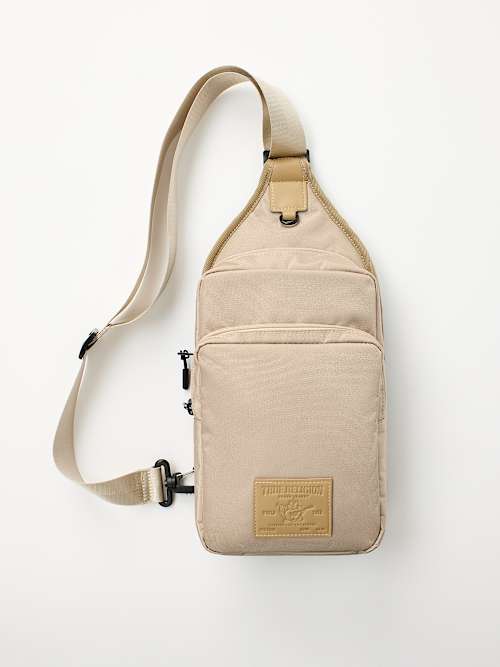 True Religion World Tour Patch Sling Bag In Brown