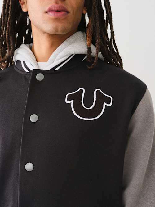 FLEECE HOODED VARSITY JACKET