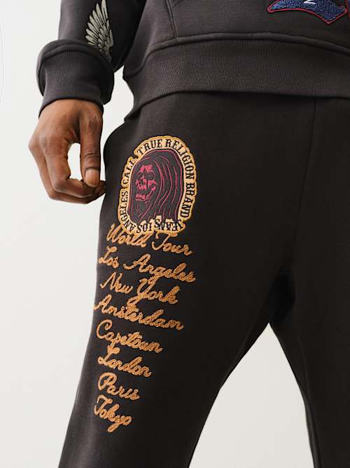 PANTALONES JOGGER CON PARCHE DE LOGOTIPO BORDADO