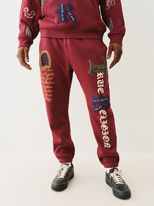 ДЖОГГЕРЫ TRUE RELIGION С ЛОГОТИПОМ И НАШИВКАМИ 