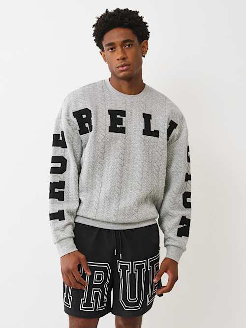 FLEECE APPLIQUÉ SWEATSHIRT