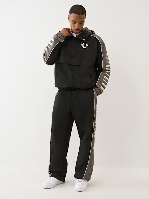 PANTALONES JOGGER DE NAILON CON BLOQUES DE COLOR