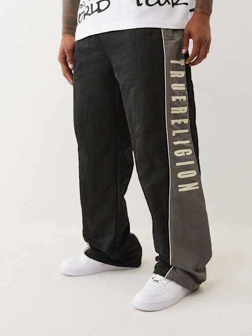 PANTALONES JOGGER DE NAILON CON BLOQUES DE COLOR