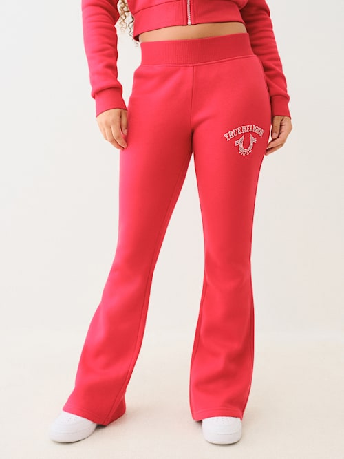 PANTALONES DEPORTIVOS CORTE DE BOTA DE TIRO MEDIO CON LOGOTIPO EN CRISTAL