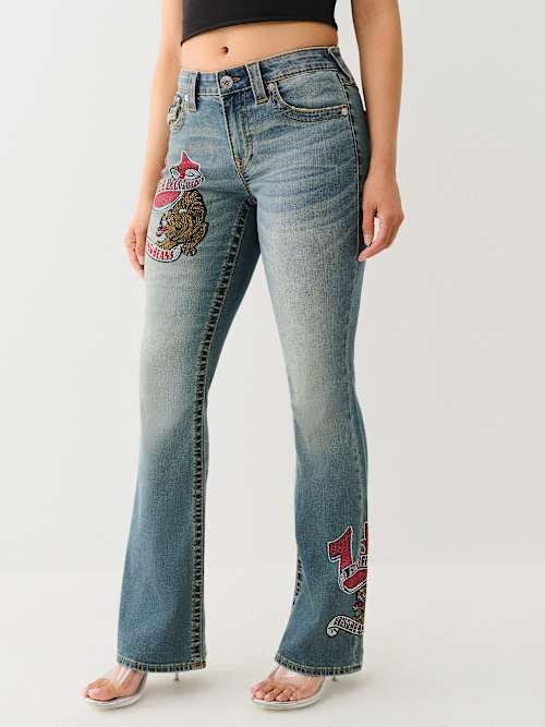 BECCA CRYSTAL TATTOO MID RISE BIG T BOOTCUT JEAN