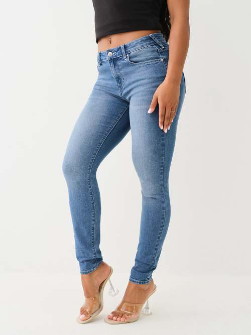 JEANS SKINNY JENNIE DE TIRO MEDIO CON TACHAS