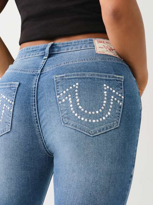JEANS SKINNY JENNIE DE TIRO MEDIO CON TACHAS