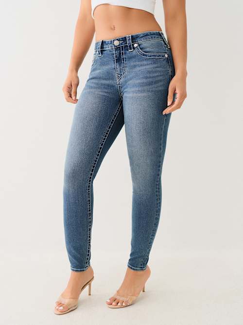 JENNIE MID RISE BIG T SKINNY JEAN