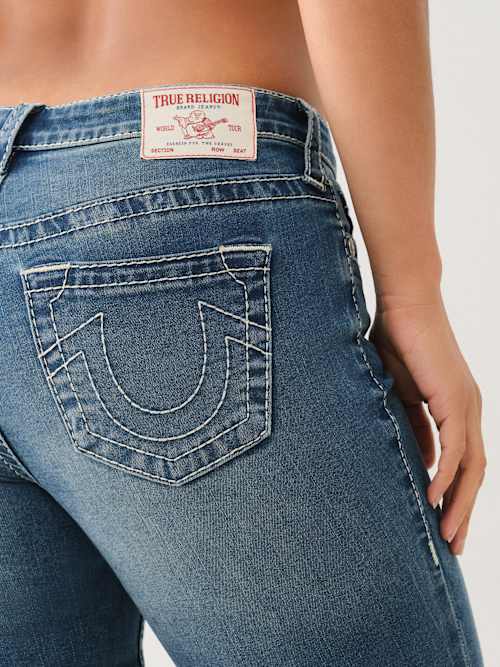 JENNIE MID RISE BIG T SKINNY JEAN