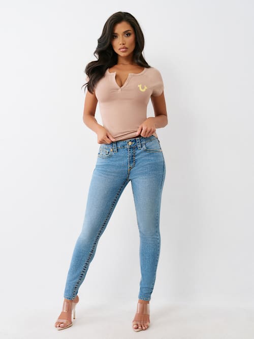 JEANS SKINNY CURVILÍNEOS JENNIE BIG T DE TIRO MEDIO