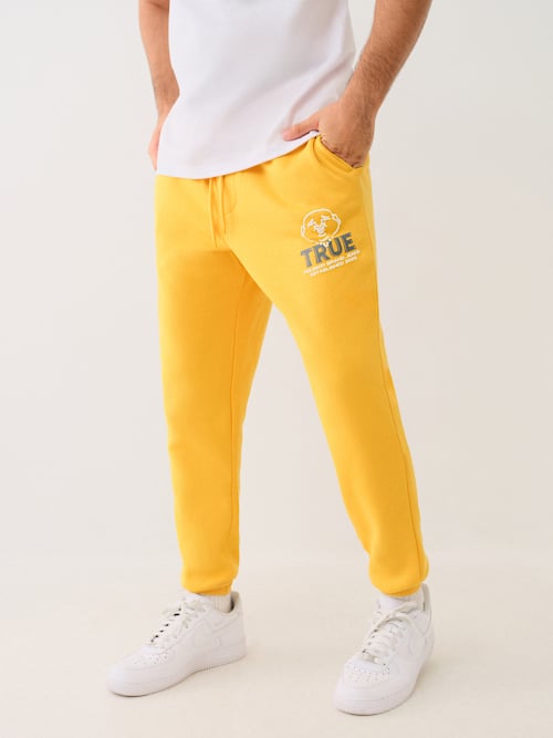 ДЖОГГЕРЫ С ИЗОБРАЖЕНИЕМ БУДДЫ ИЗ НАТУРАЛЬНОЙ КОЖИ СО СТАРИННЫМ ЭФФЕКТОМ