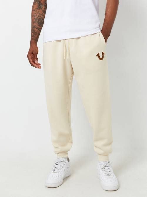 ДЖОГГЕРЫ С ЛОГОТИПОМ В ВИДЕ ПОДКОВЫ