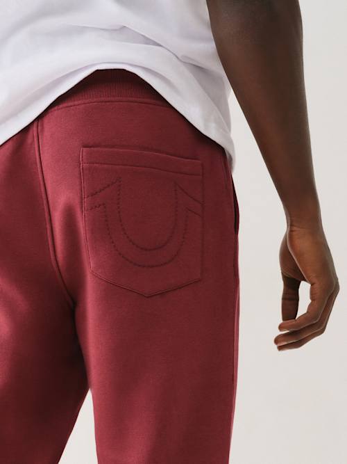 PANTALÓN DEPORTIVO DE PIERNA RECTA CON LOGOTIPO DE HERRADURA
