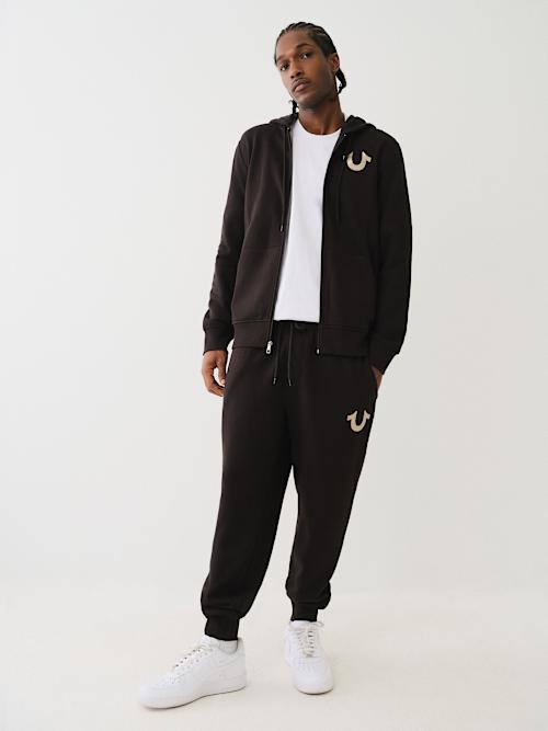 PANTALONES JOGGER CON CORDÓN Y LOGOTIPO DE HERRADURA