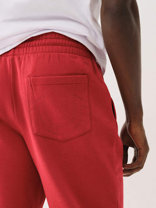 PANTALONES JOGGER CON GRÁFICO Y CUERDA