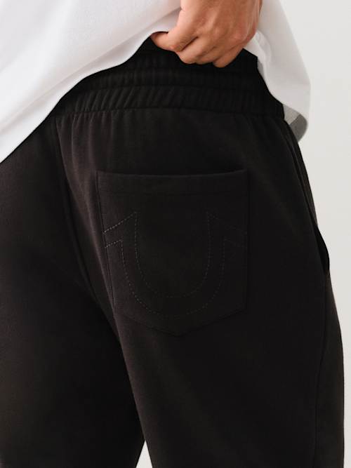 PANTALONES JOGGER CON LOGOTIPO DE ALTA DENSIDAD