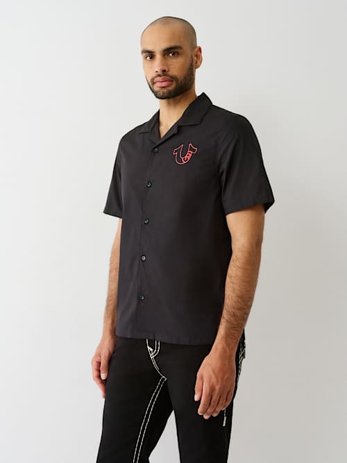 CAMISA DE POPELINA CON LOGOTIPO DE SILICONA