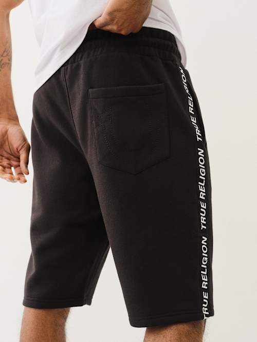 SILICONE LOGO TAPING SWEAT SHORT