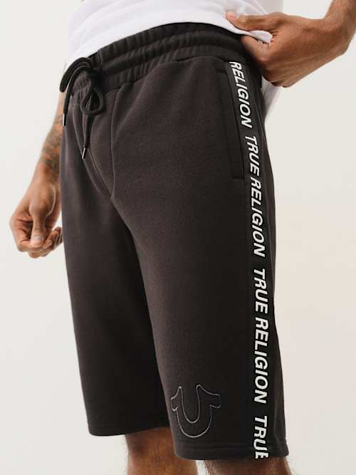 SILICONE LOGO TAPING SWEAT SHORT