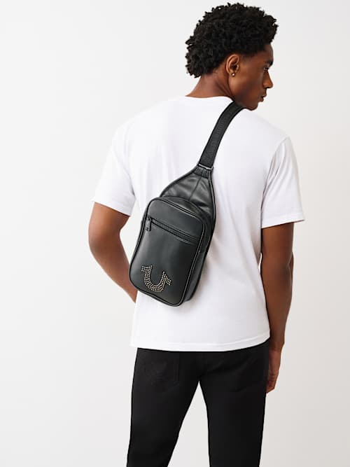 MOCHILA BANDOLERA CON INCRUSTACIONES DE HERRADURAS