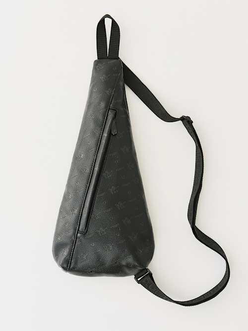 PEBBLED MONOGRAM SLING BAG