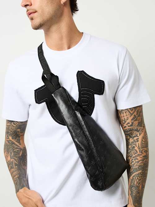 PEBBLED MONOGRAM SLING BAG