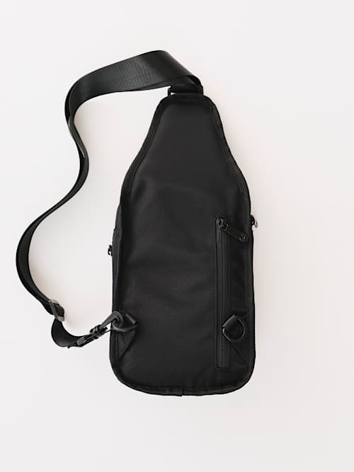 WAVY HORSESHOE SLING BAG