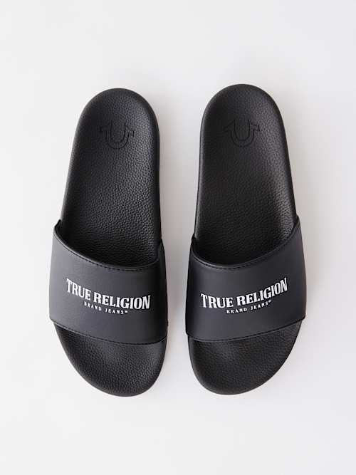 ЧЕРНЫЕ ШЛЕПАНЦЫ TRUE RELIGION CLASSIC LOGO SLIDES. 
