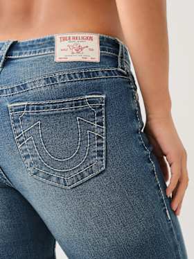 JENNIE MID RISE BIG T SKINNY JEAN