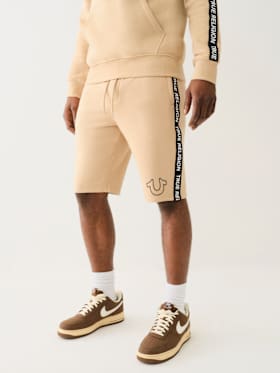 SILICONE LOGO TAPING SWEAT SHORT