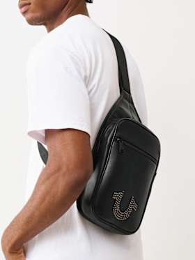 STUDDED HORSESHOE SLING BAG
