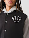 FLEECE HOODED VARSITY JACKET