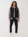FLEECE HOODED VARSITY JACKET