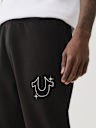 PANTALONES JOGGER CON HERRADURA DE ESTRELLAS