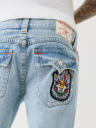 JEANS CORTE DE BOTA BILLY CON PARCHE DESTEÑIDOS