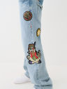 JEANS CORTE DE BOTA BILLY CON PARCHE DESTEÑIDOS