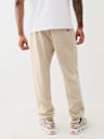PANTALONES JOGGER CON ÁGUILA BORDADA