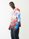 CAMISETA CON FLAMAS Y LOGOTIPO REFLECTANTE DE 02 Y TRUE RELIGION