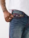 JEANS SKINNY ROCCO BORDADOS CON SOLAPA DE 32"