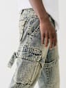 JEANS TIPO CARGO HOLGADOS CON CIERRE, CORREA Y COSTURA BIG T