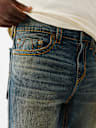 JEANS SKINNY ROCCO CON HERRADURA TRADICIONAL Y COSTURAS BIG T