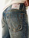 JEANS SKINNY ROCCO CON HERRADURA TRADICIONAL Y COSTURAS BIG T