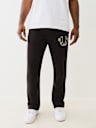 PANTALÓN DEPORTIVO CON HERRADURA PROPERTY OF NONE