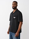 CAMISETA CON CUELLO DE CAMPANA WORLD TOUR