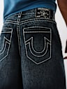 JEANS DE BARRIL CON COSTURA SUPER T